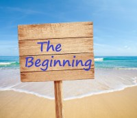 wood road sign on sea beach